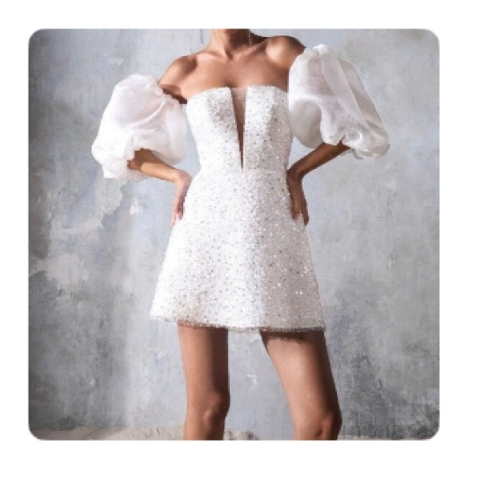 White Mini Fit and Flare Dress with Puff Sleeves and Plunge Neckline
